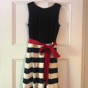 Fit and flare black and white dress with red belt